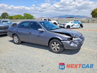 Czwarte zdjęcie samochodu z boku: 1999 TOYOTA CAMRY LE VIN:4T1BG22K4XU898499 - miniatura