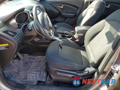 Zdjęcie 7 z 13 samochodu: 2010 HYUNDAI TUCSON GLS VIN:KM8JT3AC0AU018817 - miniatura