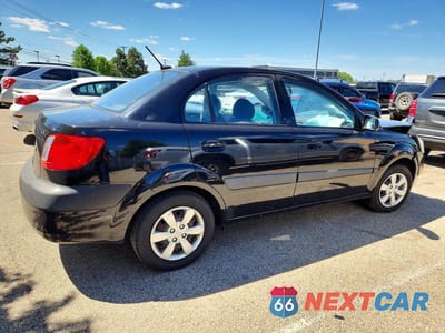 Trzecie zdjęcie samochodu z tyłu: 2009 KIA RIO BASE VIN:KNADE223396469743 - miniatura