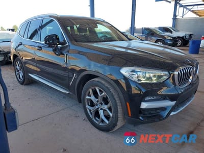 Czwarte zdjęcie samochodu z boku: 2021 BMW X3 SDRIVE30I VIN:5UXTY3C06M9F43505 - miniatura