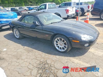 Czwarte zdjęcie samochodu z boku: 2002 JAGUAR XKR VIN:SAJDA42B02PA25774 - miniatura