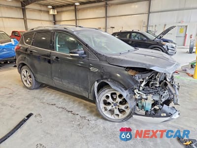 Czwarte zdjęcie samochodu z boku: 2013 FORD ESCAPE TITANIUM VIN:1FMCU9J97DUD02088 - miniatura