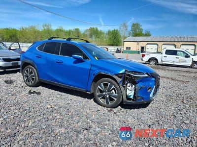 Czwarte zdjęcie samochodu z boku: 2023 LEXUS UX 250H BASE VIN:JTHX6JBH2P2133832 - miniatura