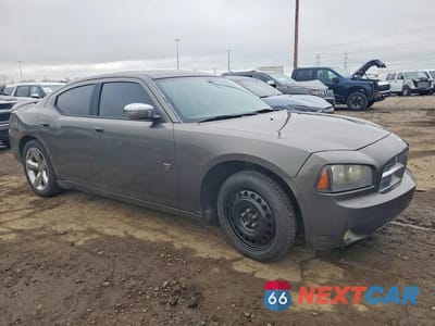 Czwarte zdjęcie samochodu z boku: 2008 DODGE CHARGER SXT VIN:2B3KA33G28H330991 - miniatura