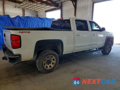 Trzecie zdjęcie samochodu z tyłu: 2015 CHEVROLET SILVERADO K2500 HEAVY DUTY LTZ VIN:1GC1KWEG4FF628494 - miniatura