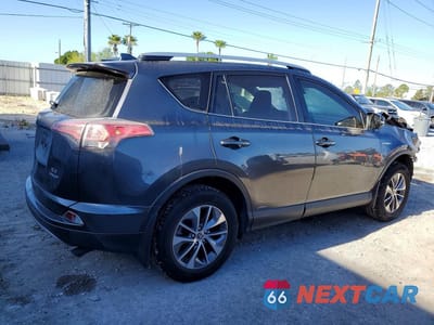 Trzecie zdjęcie samochodu z tyłu: 2018 TOYOTA RAV4 HYBRID XLE VIN:JTMRJREV8JD201216 - miniatura