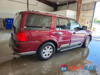 Trzecie zdjęcie samochodu z tyłu: 2004 LINCOLN NAVIGATOR VIN:5LMFU28RX4LJ30491 - miniatura