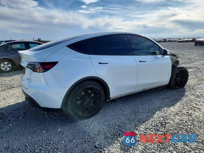 Trzecie zdjęcie samochodu z tyłu: 2022 TESLA MODEL Y VIN:7SAYGAEE5NF517735 - miniatura