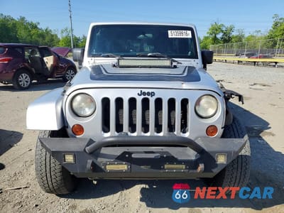 Piąte zdjęcie samochodu w środku: 2012 JEEP WRANGLER UNLIMITED SAHARA VIN:1C4BJWEG1CL260473 - miniatura