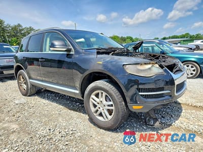 Czwarte zdjęcie samochodu z boku: 2008 VOLKSWAGEN TOUAREG 2 V6 VIN:WVGBE77L18D013682 - miniatura
