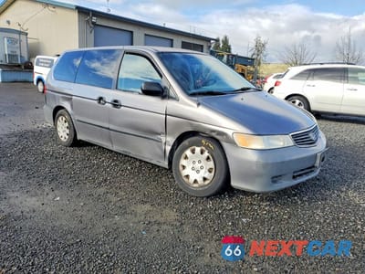 Czwarte zdjęcie samochodu z boku: 2000 HONDA ODYSSEY LX VIN:2HKRL1855YH574791 - miniatura