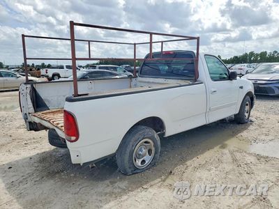 Czwarte zdjęcie samochodu z boku: 2003 FORD F150 VIN:1FTRF17223NA53972 - miniatura