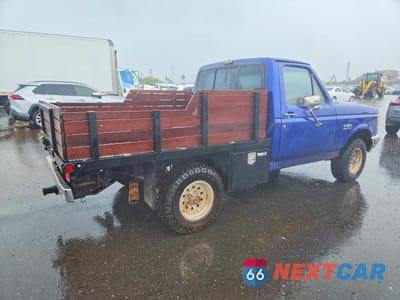 Trzecie zdjęcie samochodu z tyłu: 1987 FORD F150 FLATBED TRUCK VIN:1FTEF14H4HKA46876 - miniatura