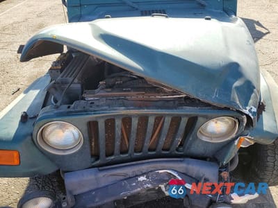 Zdjęcie 11 z 12 samochodu: 2000 JEEP WRANGLER / TJ SPORT VIN:1J4FA49S9YP721689 - miniatura