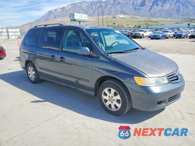Czwarte zdjęcie samochodu z boku: 2004 HONDA ODYSSEY EXL VIN:5FNRL18954B074318 - miniatura