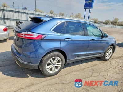 Trzecie zdjęcie samochodu z tyłu: 2019 FORD EDGE SEL VIN:2FMPK4J95KBB21102 - miniatura