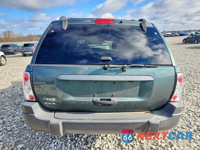 Zdjęcie 6 z 13 samochodu: 2004 JEEP GRAND CHEROKEE LAREDO VIN:1J4GW48S64C263621 - miniatura