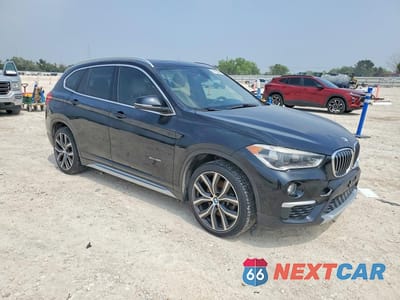 Czwarte zdjęcie samochodu z boku: 2017 BMW X1 XDRIVE28I VIN:WBXHT3C35H5F75779 - miniatura