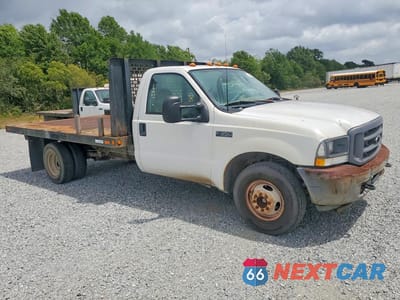Czwarte zdjęcie samochodu z boku: 2003 FORD F350 SUPER DUTY VIN:1FDWF36L73ED73695 - miniatura