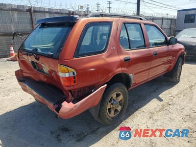 Trzecie zdjęcie samochodu z tyłu: 1999 ISUZU RODEO S VIN:4S2CK58W0X4347784 - miniatura