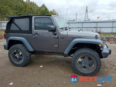 Czwarte zdjęcie samochodu z boku: 2016 JEEP WRANGLER SPORT VIN:1C4AJWAG8GL261658 - miniatura