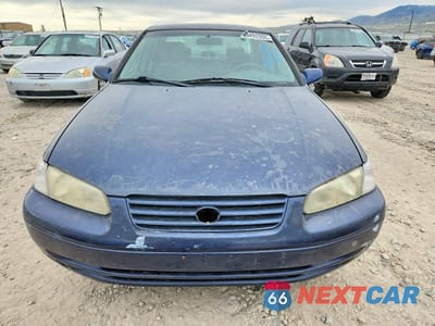 Piąte zdjęcie samochodu w środku: 1999 TOYOTA CAMRY LE VIN:JT2BG28K3X0290095 - miniatura