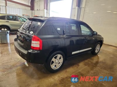 Trzecie zdjęcie samochodu z tyłu: 2010 JEEP COMPASS SPORT VIN:1J4NF1FB7AD675836 - miniatura