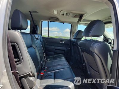 Zdjęcie 11 z 13 samochodu: 2013 HONDA PILOT TOURING VIN:5FNYF3H97DB030898 - miniatura
