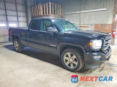 Czwarte zdjęcie samochodu z boku: 2018 GMC SIERRA K1500 VIN:1GTV2LEH3JZ361509 - miniatura