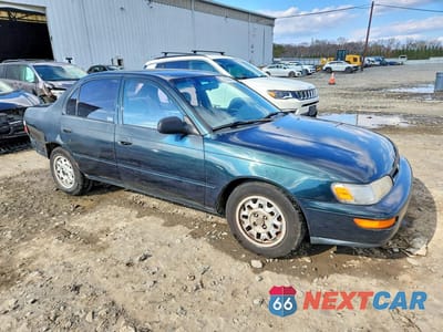 Czwarte zdjęcie samochodu z boku: 1996 TOYOTA COROLLA BASE VIN:1NXBA02E1TZ475566 - miniatura