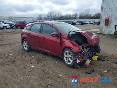 Czwarte zdjęcie samochodu z boku: 2014 FORD FOCUS SE VIN:1FADP3K20EL405381 - miniatura