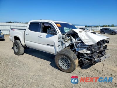 Czwarte zdjęcie samochodu z boku: 2021 TOYOTA TACOMA TRD SPORT VIN:3TMCZ5AN3MM423099 - miniatura