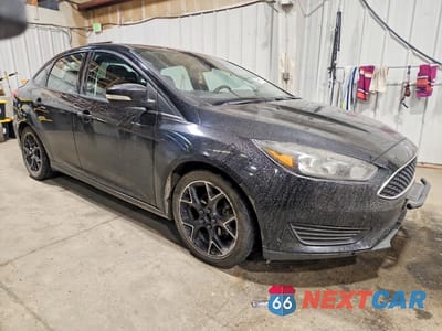 Czwarte zdjęcie samochodu z boku: 2017 FORD FOCUS SE VIN:1FADP3F29HL255561 - miniatura