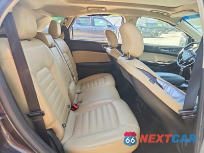 Zdjęcie 11 z 13 samochodu: 2015 FORD EDGE SEL VIN:2FMTK4J81FBC27722 - miniatura