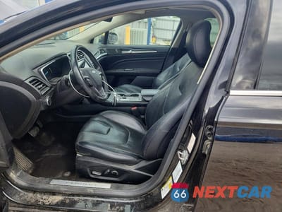 Zdjęcie 7 z 12 samochodu: 2019 FORD FUSION TITANIUM VIN:3FA6P0RUXKR277453 - miniatura