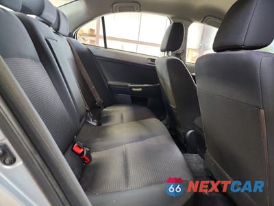 Zdjęcie 10 z 13 samochodu: 2009 MITSUBISHI LANCER ES 4DR VIN:JA3AU26U39U608808 - miniatura