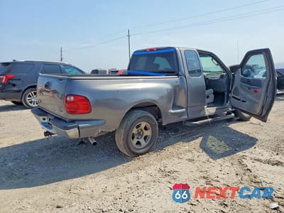 Trzecie zdjęcie samochodu z tyłu: 2003 FORD F150 VIN:1FTRX07263KB49872 - miniatura