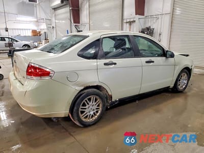 Trzecie zdjęcie samochodu z tyłu: 2010 FORD FOCUS SE VIN:1FAHP3FN7AW115931 - miniatura