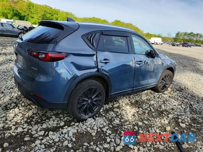 Trzecie zdjęcie samochodu z tyłu: 2023 MAZDA CX-5 PREFERRED VIN:JM3KFBCM3P0245054 - miniatura