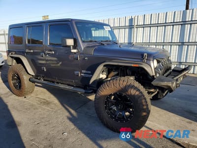 Czwarte zdjęcie samochodu z boku: 2014 JEEP WRANGLER UNLIMITED SPORT VIN:1C4BJWDGXEL298269 - miniatura