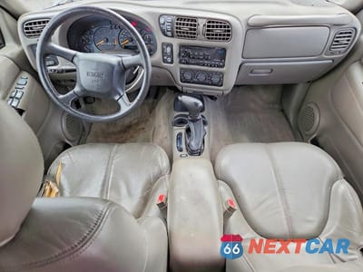 Zdjęcie 8 z 14 samochodu: 1999 GMC JIMMY VIN:1GKDT13WXX2549416 - miniatura