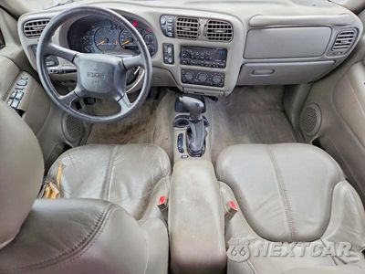 Zdjęcie 8 z 14 samochodu: 1999 GMC JIMMY VIN:1GKDT13WXX2549416 - miniatura