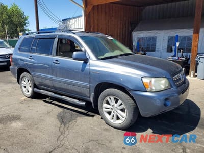 Czwarte zdjęcie samochodu z boku: 2006 TOYOTA HIGHLANDER HYBRID VIN:JTEEW21A560008543 - miniatura