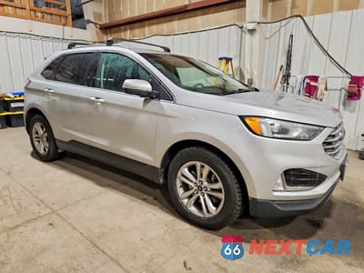 Czwarte zdjęcie samochodu z boku: 2019 FORD EDGE SEL VIN:2FMPK4J93KBB15539 - miniatura