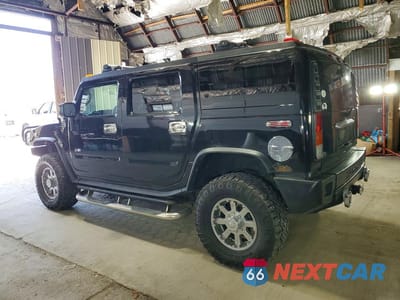 Drugie zdjęcie samochodu z przodu: 2004 HUMMER H2 VIN:5GRGN23U74H107367 - miniatura