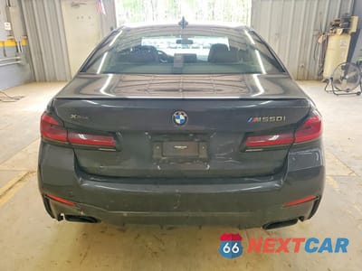 Zdjęcie 6 z 12 samochodu: 2022 BMW M550XI VIN:WBA13BK04NCJ34467 - miniatura