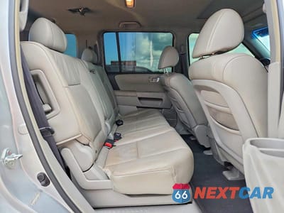 Zdjęcie 11 z 14 samochodu: 2009 HONDA PILOT EXL VIN:5FNYF38529B020977 - miniatura
