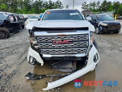 Piąte zdjęcie samochodu w środku: 2021 GMC CANYON DENALI VIN:1GTG6EEN4M1188620 - miniatura