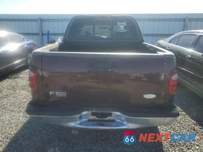 Zdjęcie 6 z 12 samochodu: 2001 FORD F150 SUPERCREW VIN:1FTRW07L11KD66626 - miniatura