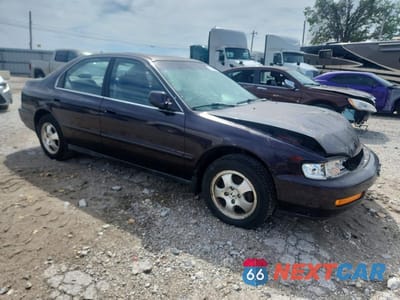 Czwarte zdjęcie samochodu z boku: 1997 HONDA ACCORD SE VIN:1HGCD5600VA085186 - miniatura